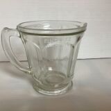 Old glass measuring pitcher