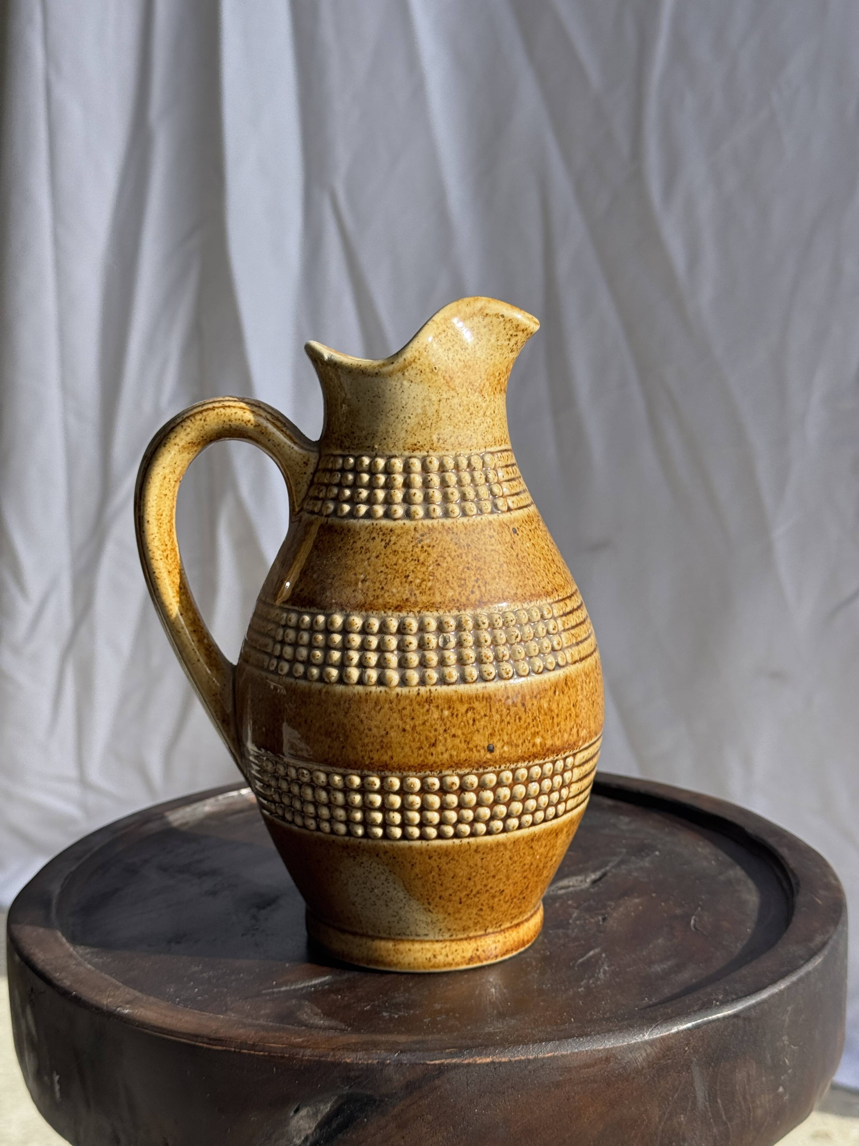 Vintage yellow stoneware carafe with beaded friezes Made in France H22