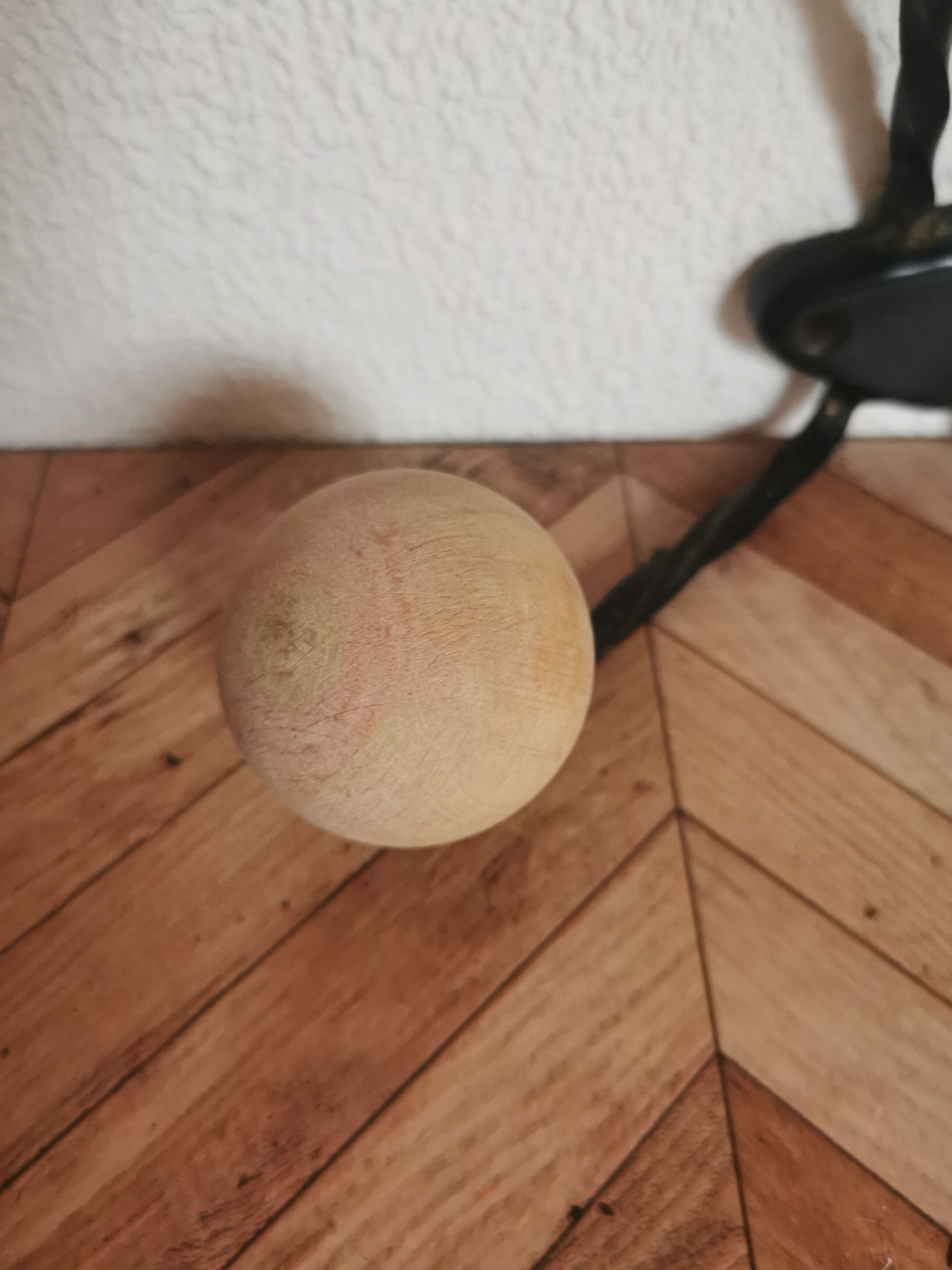 Wooden and iron wall coat holder