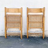 Pair of folding chairs with cane seat