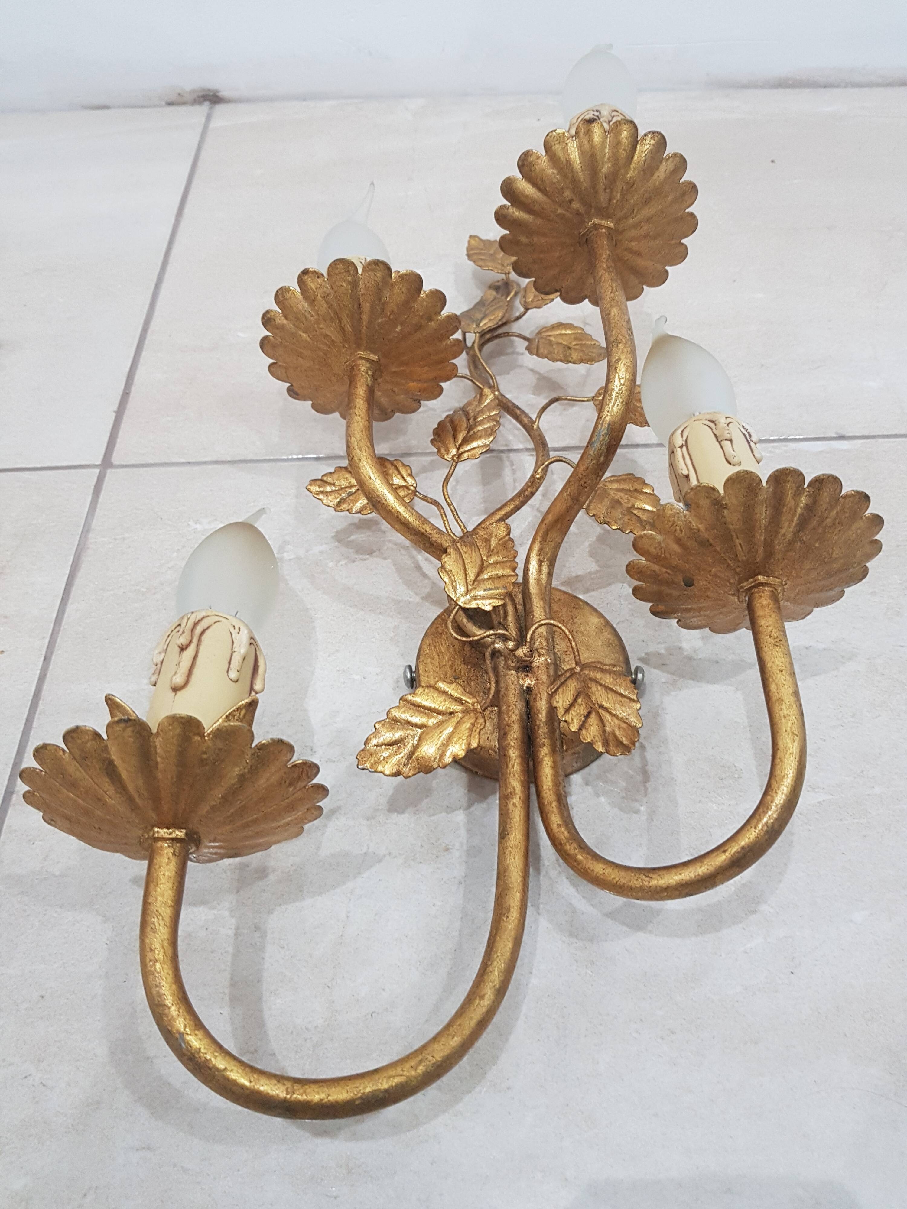 A pair of wall lamps / Coco Chanel / Hollywood Regency / France, 1960s