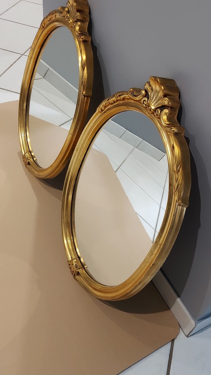 Paire de miroirs oval  doré vintage