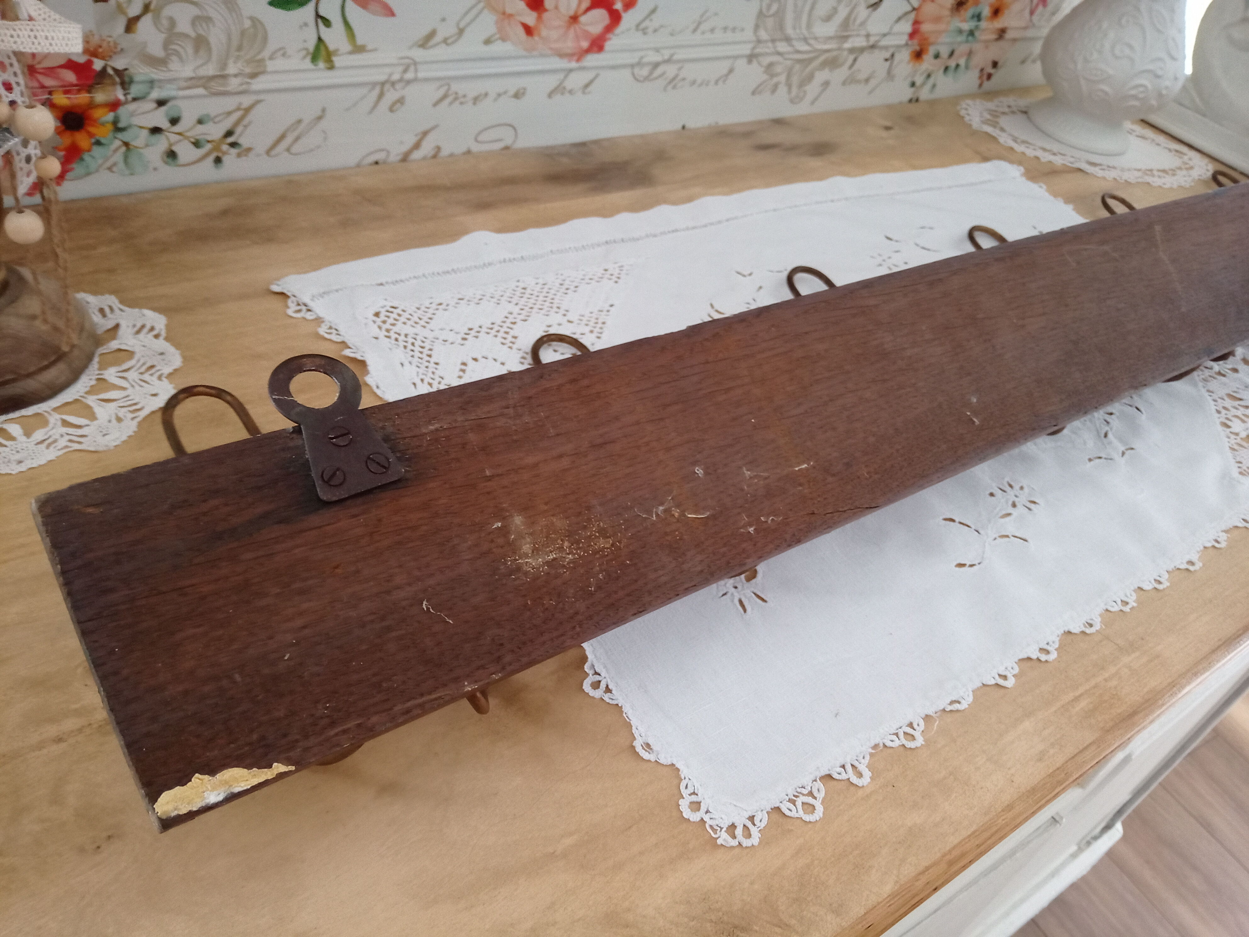 Wall coat rack 6 brass patères form mascarons