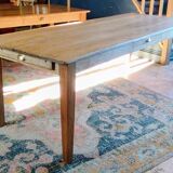 Solid oak farmhouse table with central drawer and extension
