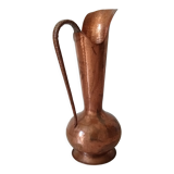 Old italian amphora vase in hammered copper