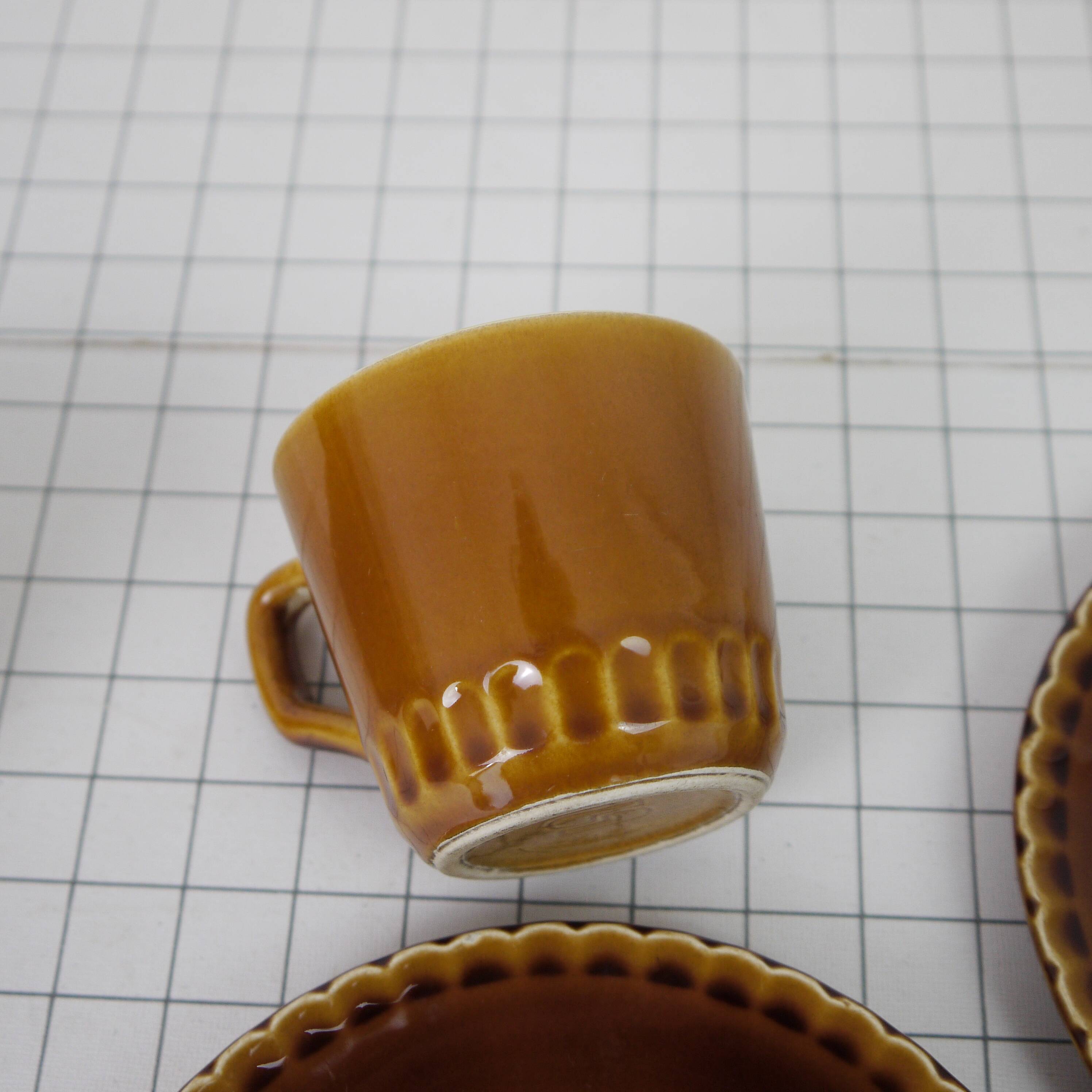 Two Digoin cups and saucers