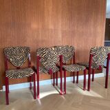 4 red lacquered zebra chairs