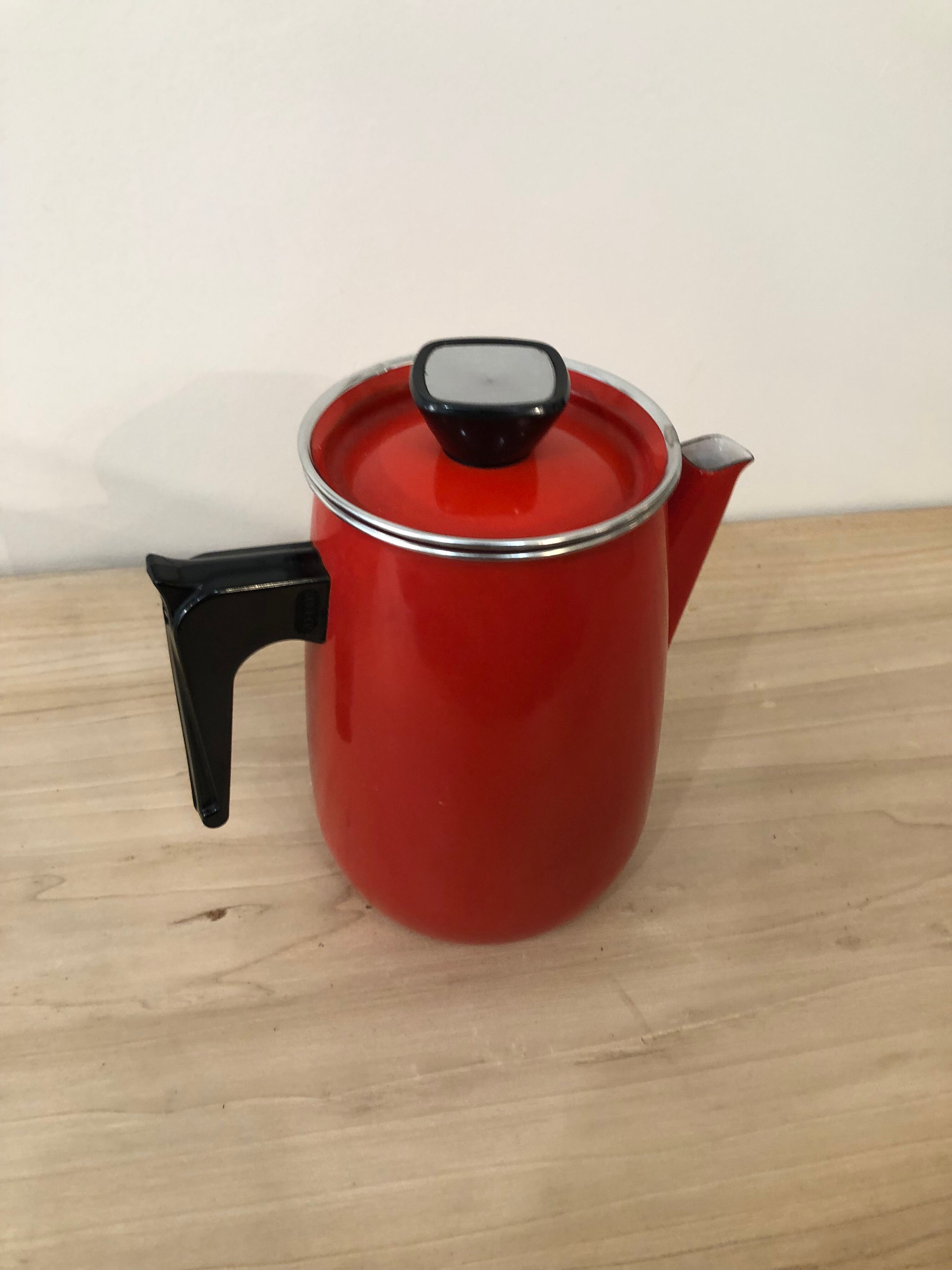 Red enamel coffee maker with filter