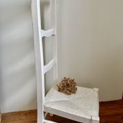 Old white mulched wooden chair