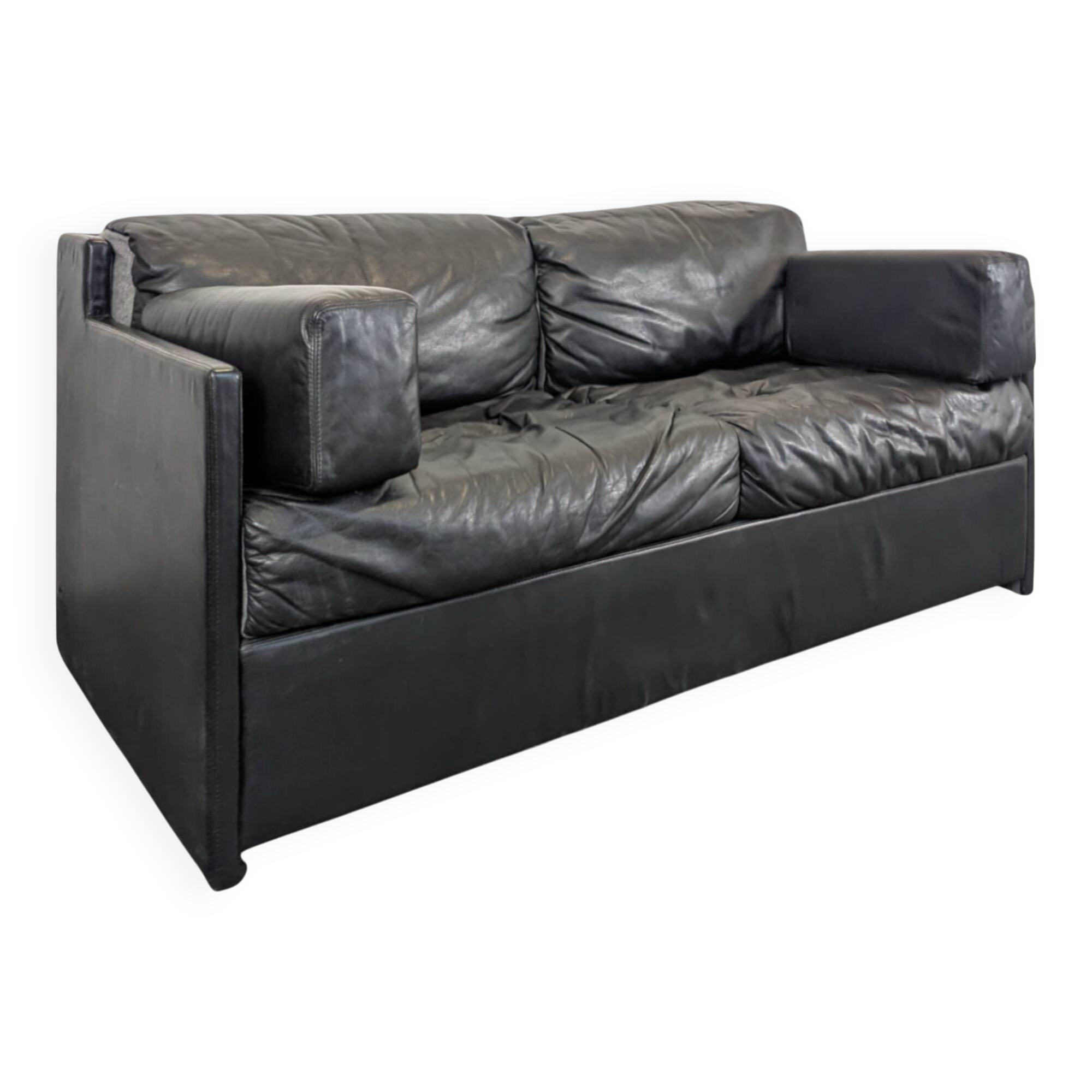 Black leather convertible sofa with goose feather upholstery.