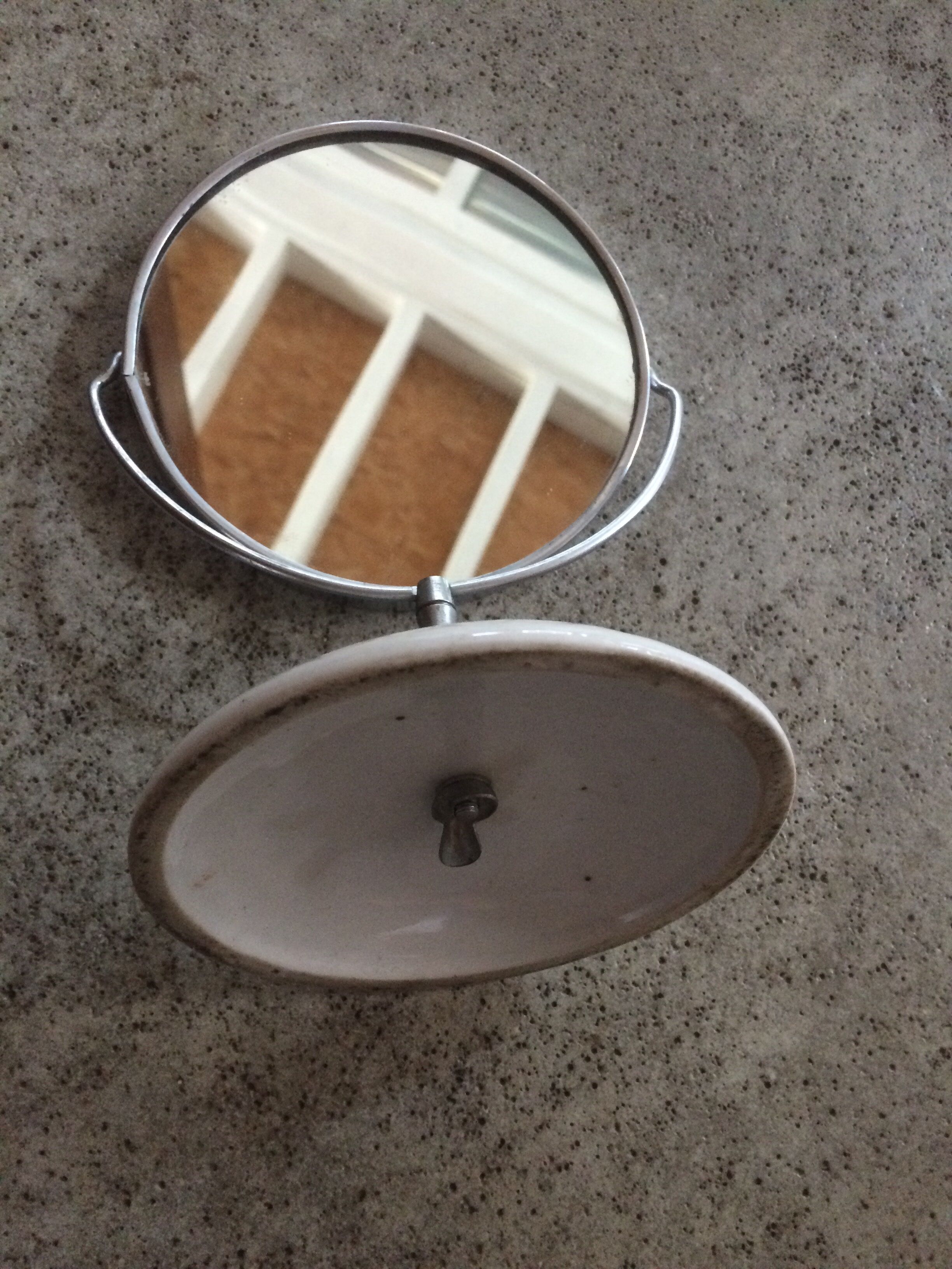 Porcelain swivel mirror
