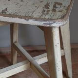 Old workshop stool in patinated solid wood
