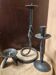 Set of 3 candlesticks and a candle holder in wrought iron.