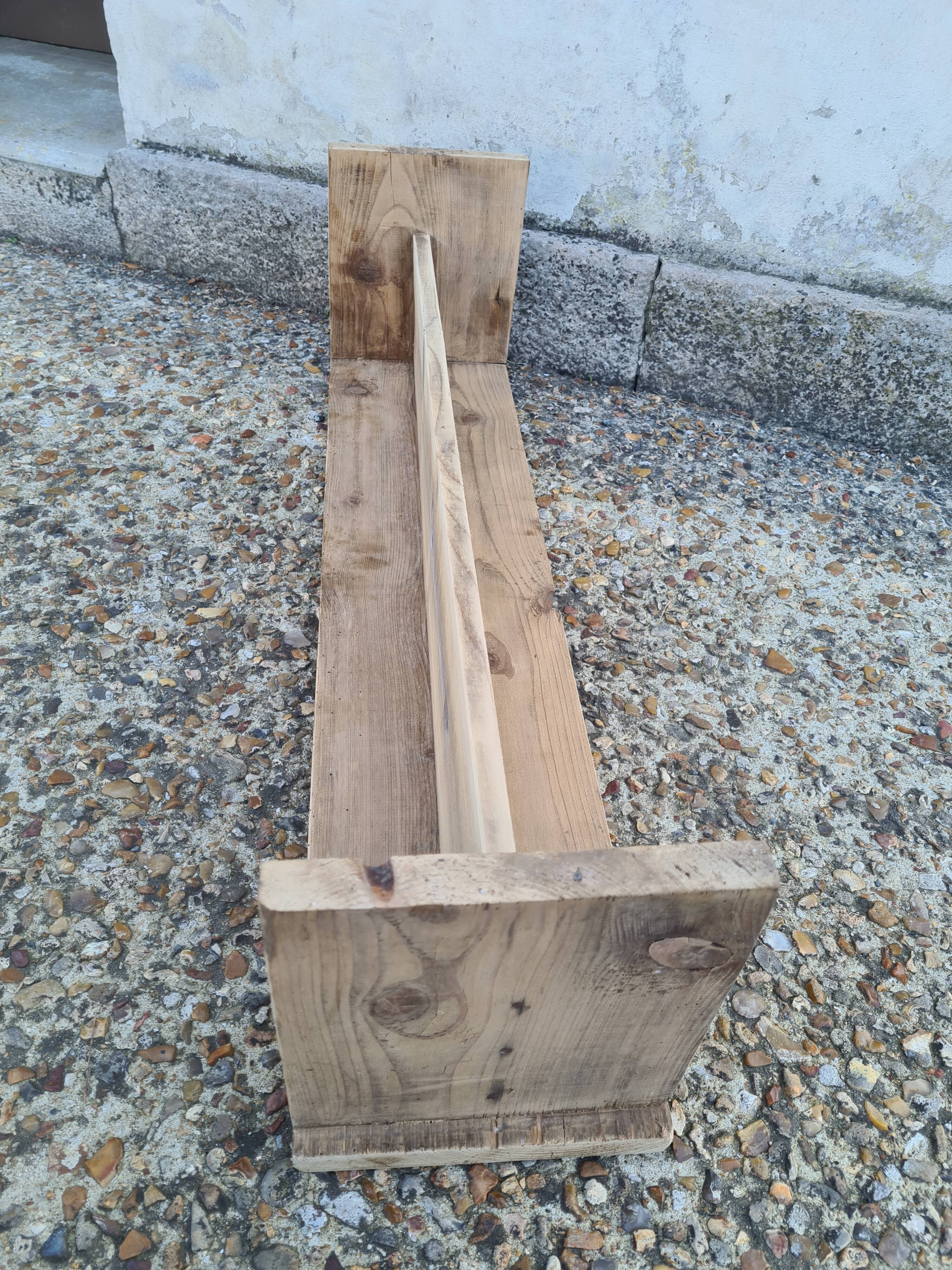 Small raw wood bench