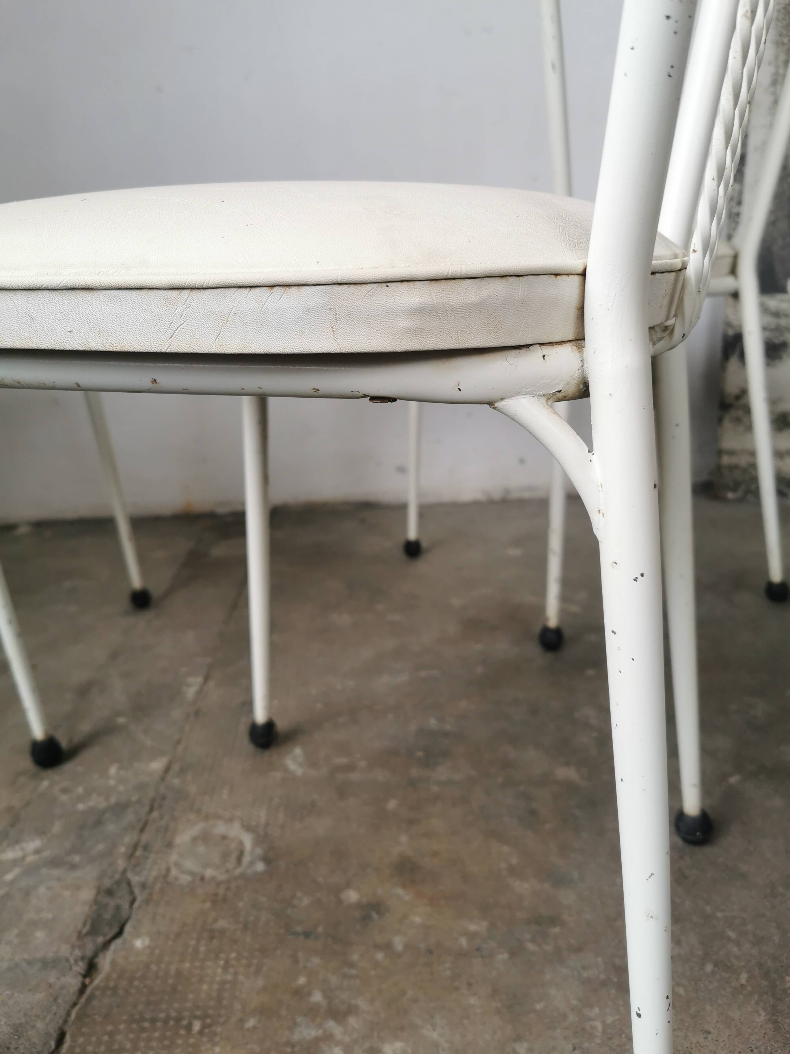 Set of 4 vintage chairs in metal and Skai