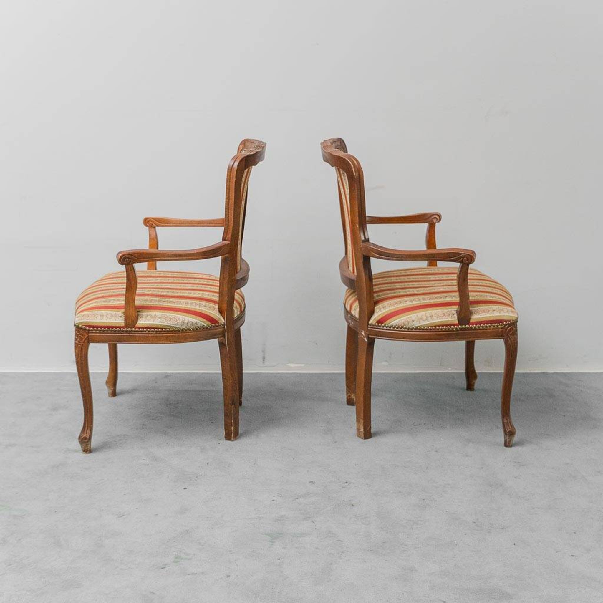 Pair of Parisian-style armchairs in wood with striped fabric armrests, vintage