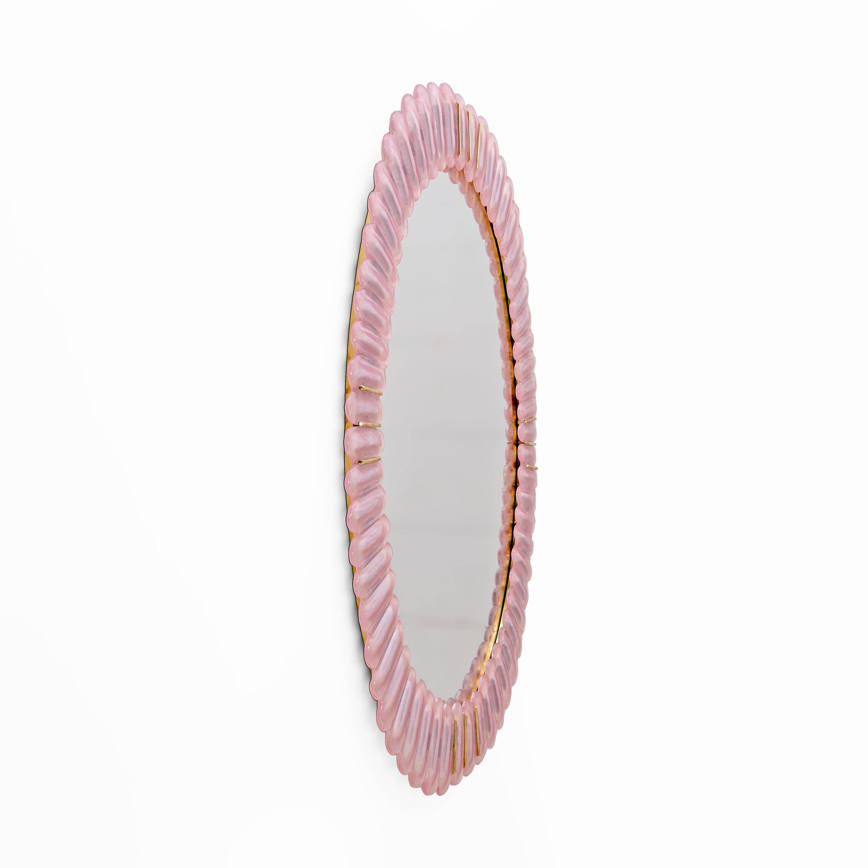 Italian oval mirror in brass and pink blown Murano glass