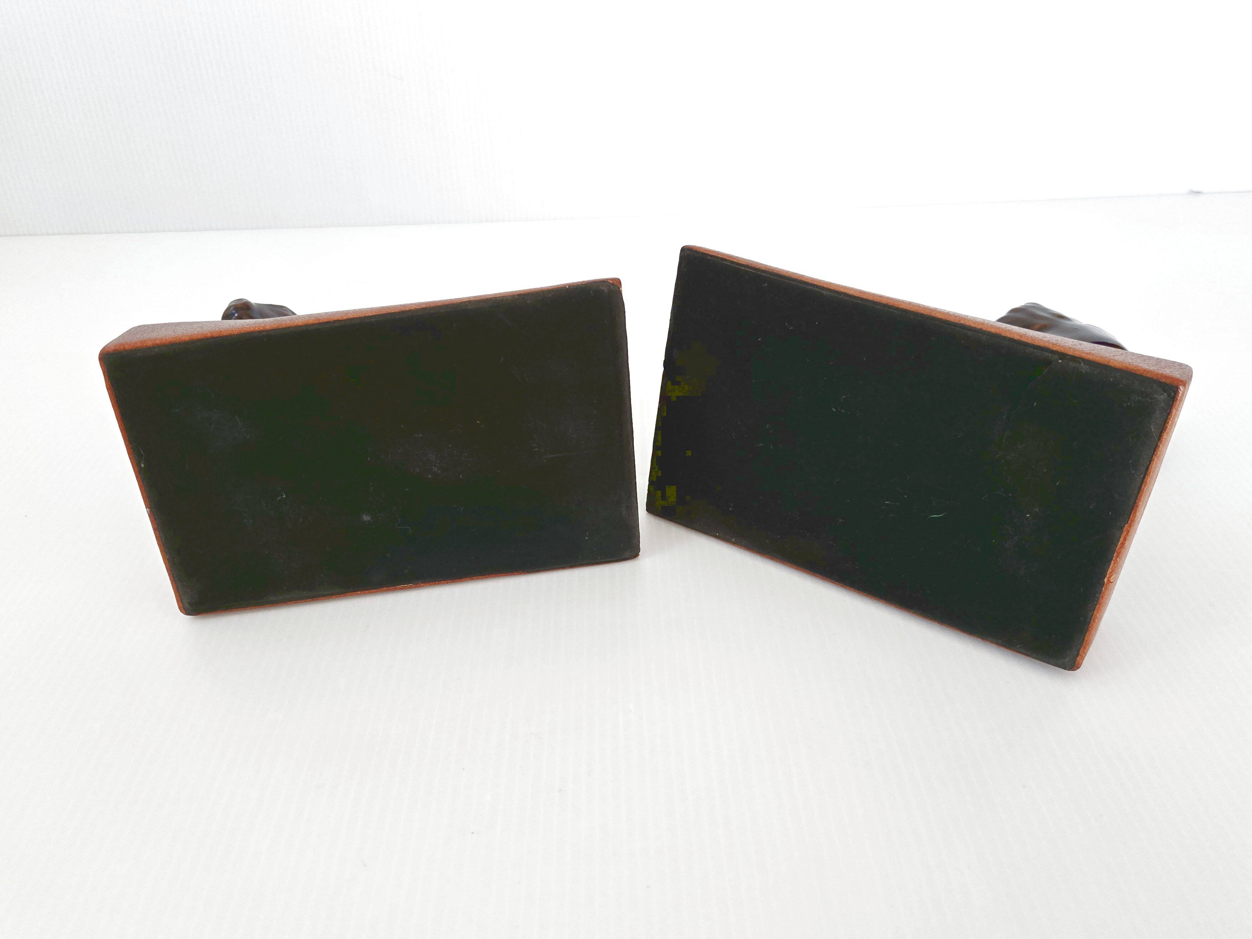 Pair of vintage leather & ceramic bookends