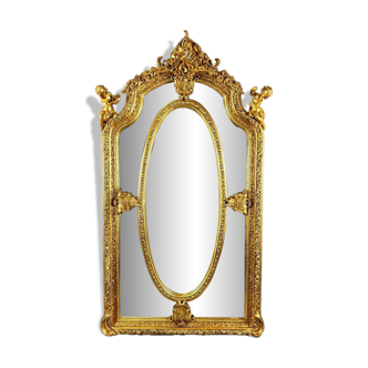 Large Louis XV style mirror in carved and gilded wood, 19th century