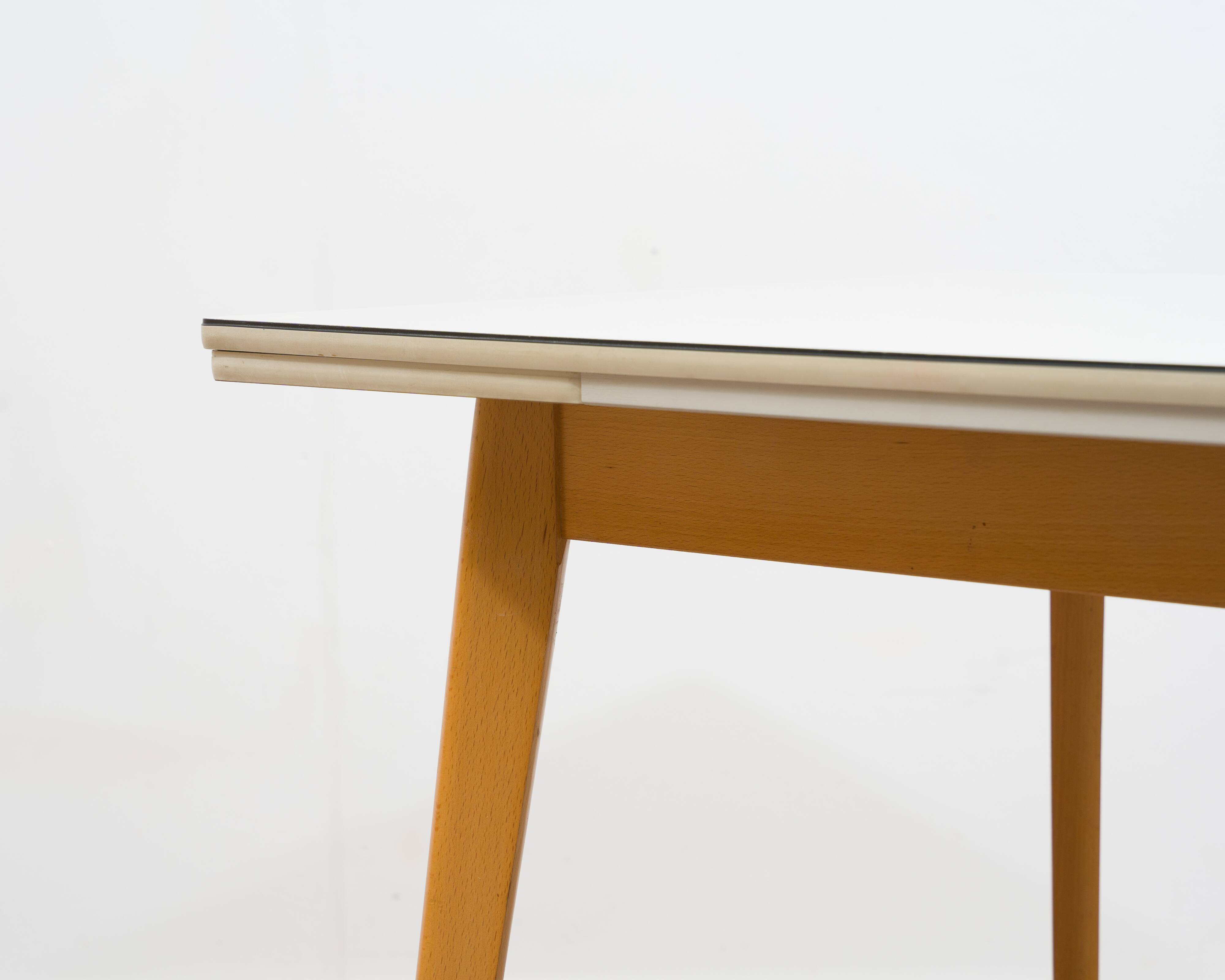 Dining table from the 1950s, grey resin top.