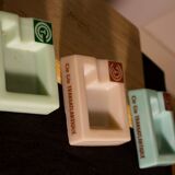 Three opalex ashtrays at the Logo of the Trans-Atlantic General Company - French Line - Model created by Jean Luce for the cruises of the liner Normandy and France