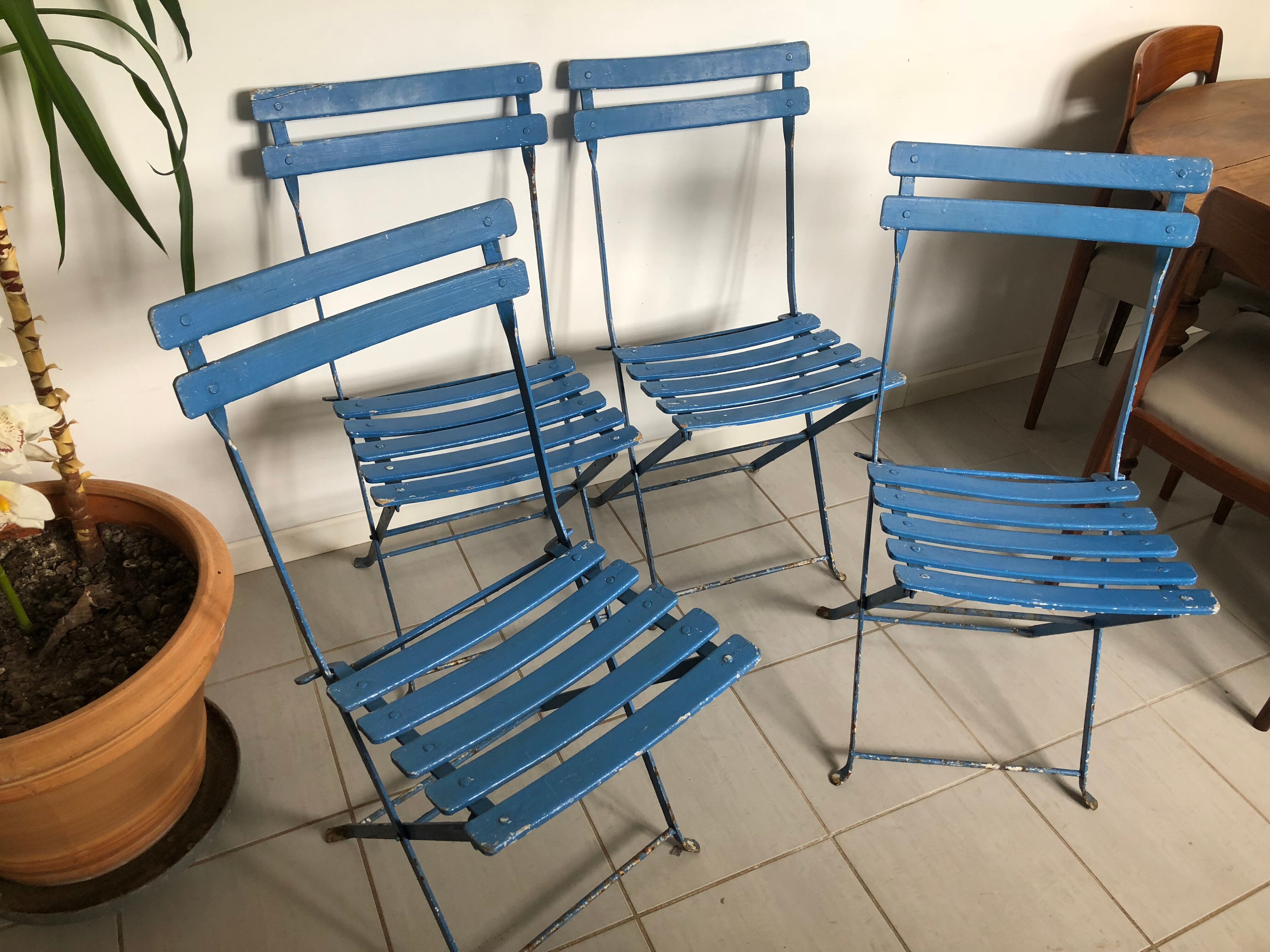 4 old folding chairs