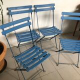 4 old folding chairs