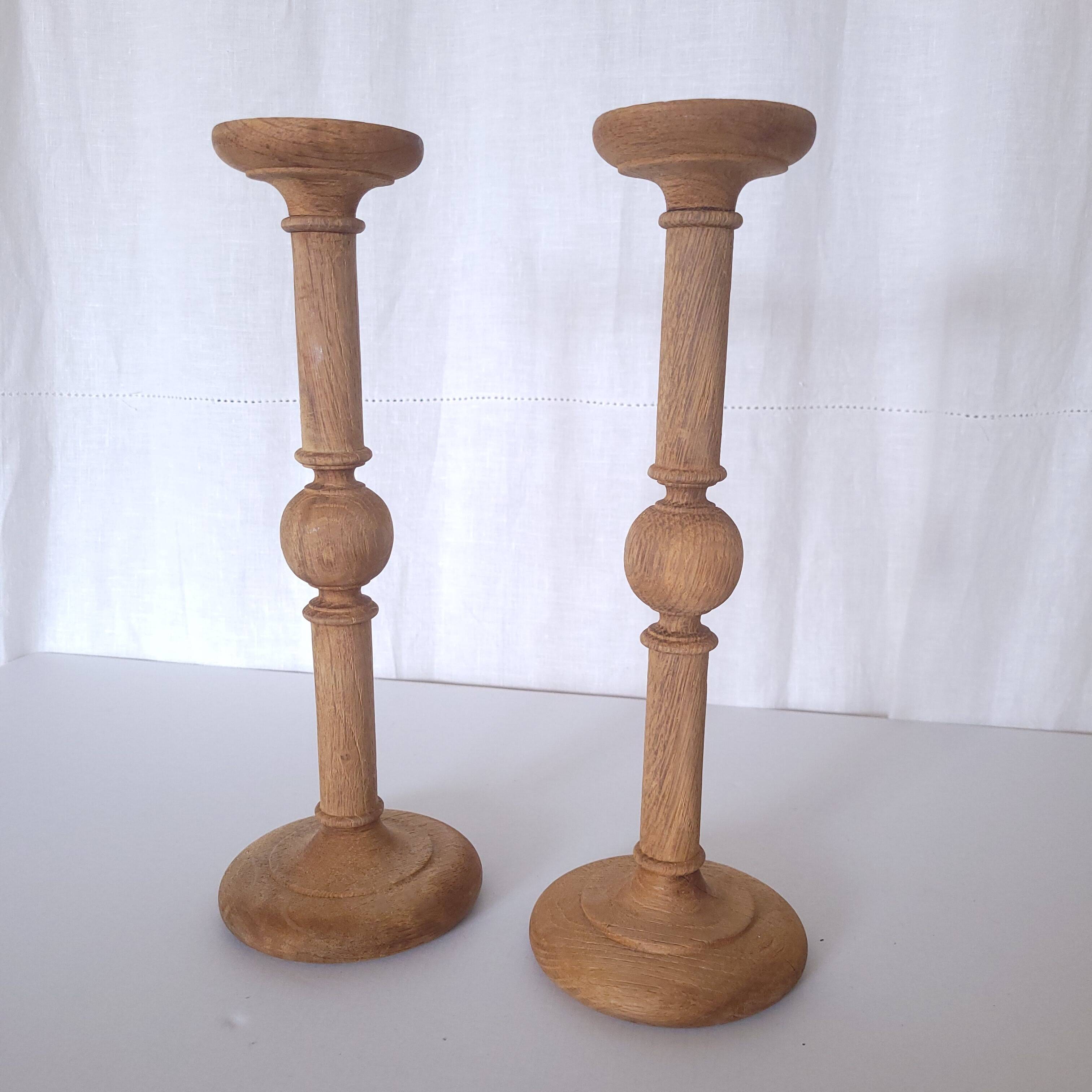 Large carved wooden candlesticks