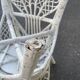 Pair of white peacock rattan chairs, circa 1960