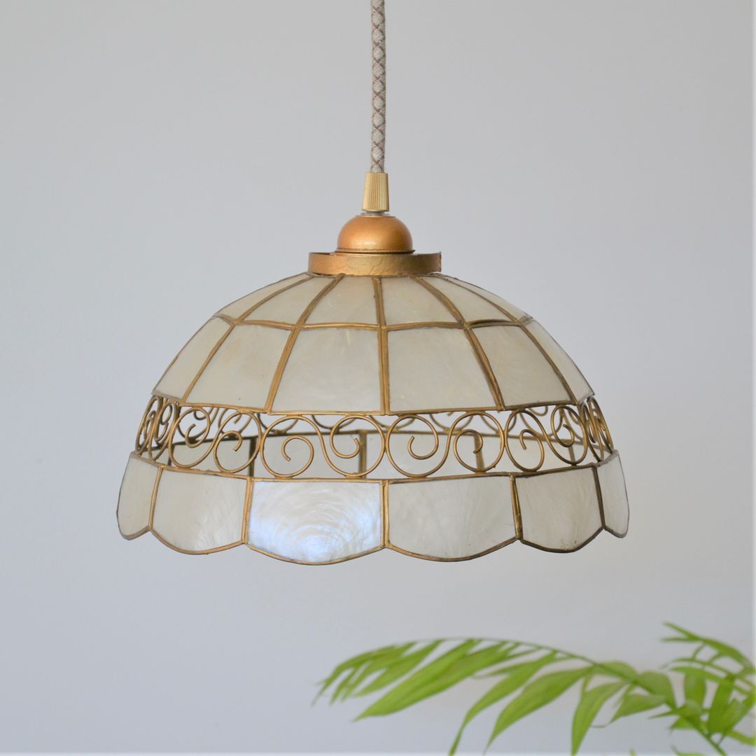 Mother-of-pearl and brass suspension