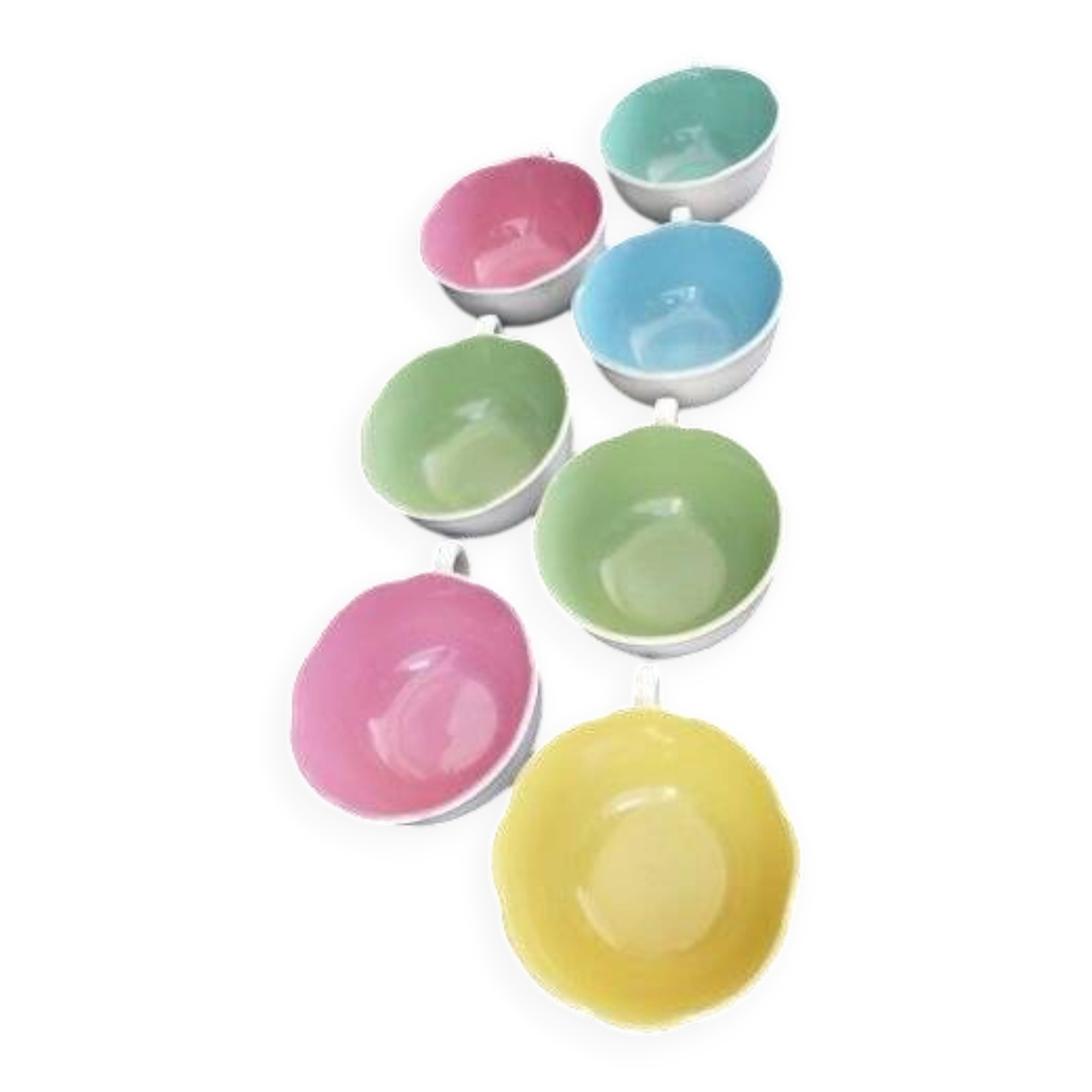 Set of 7 vintage ceramic cups from the 1960s.