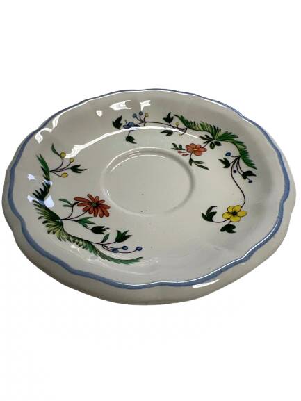 Gien earthenware saucer, decorated with birds of paradise.