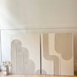 Beige and white relief diptych panels