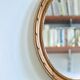 Antique oval mirror in carved wood