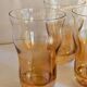 Four iridescent honey blown glass glasses