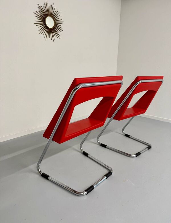 2 chaises tubulaire en simili rouge, années 80 en simili rouge