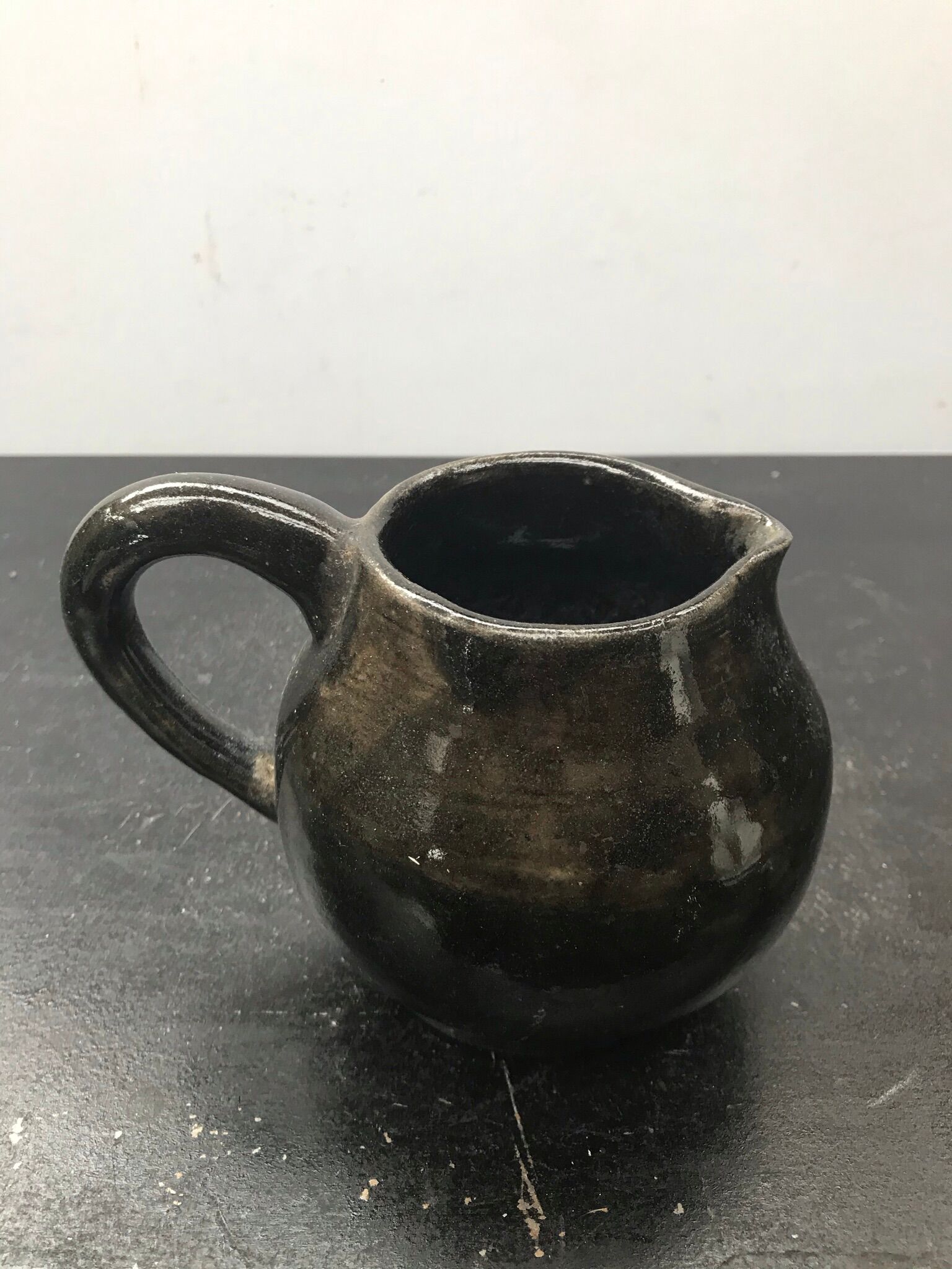 Former black ceramics pitcher 70
