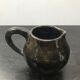 Former black ceramics pitcher 70