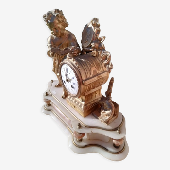 Marble clock and gilded regul