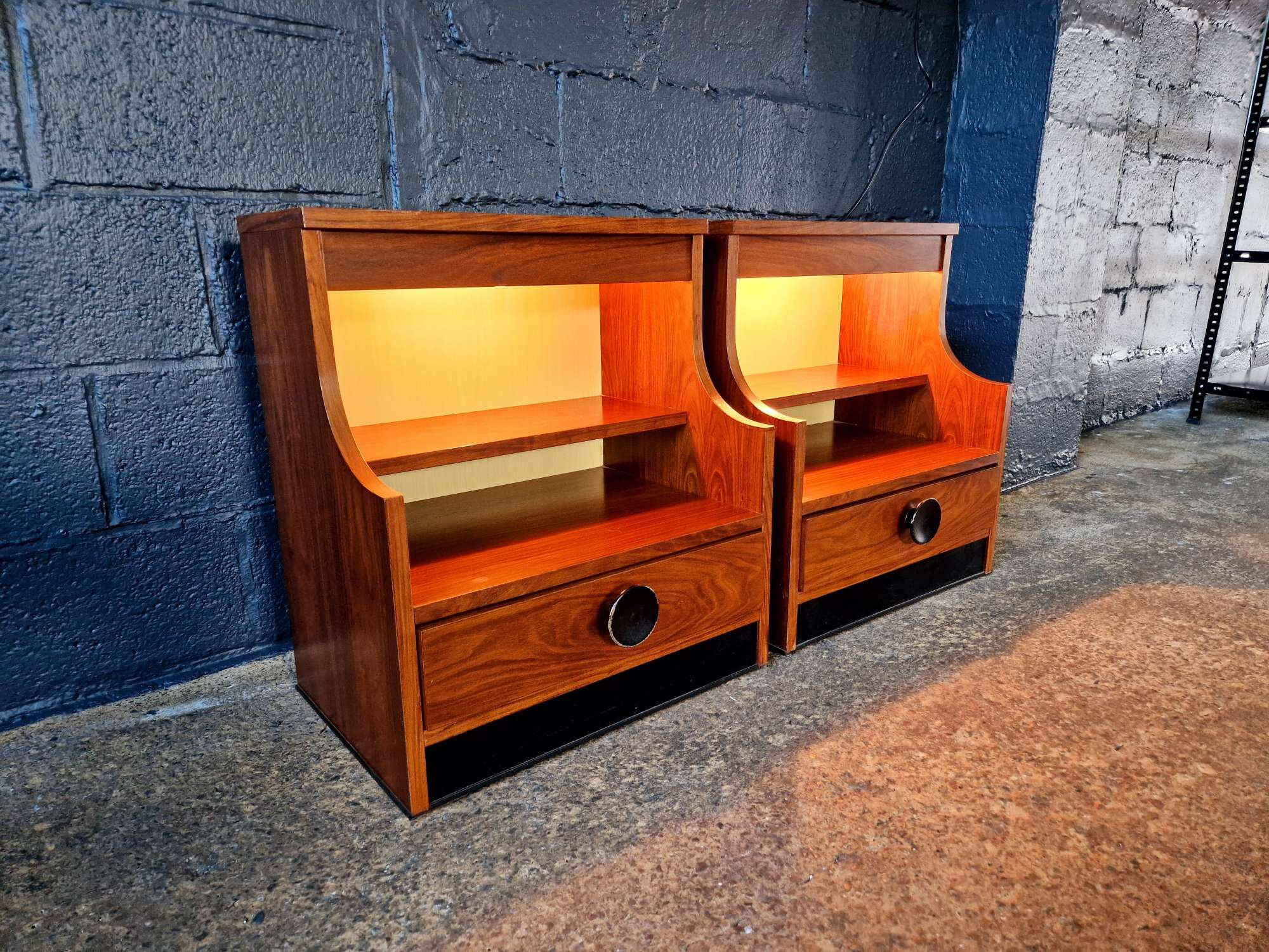 Pair of rosewood bedside tables, 1960s-70s