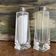 Glass salt and pepper shaker with a mother-of-pearl knob.