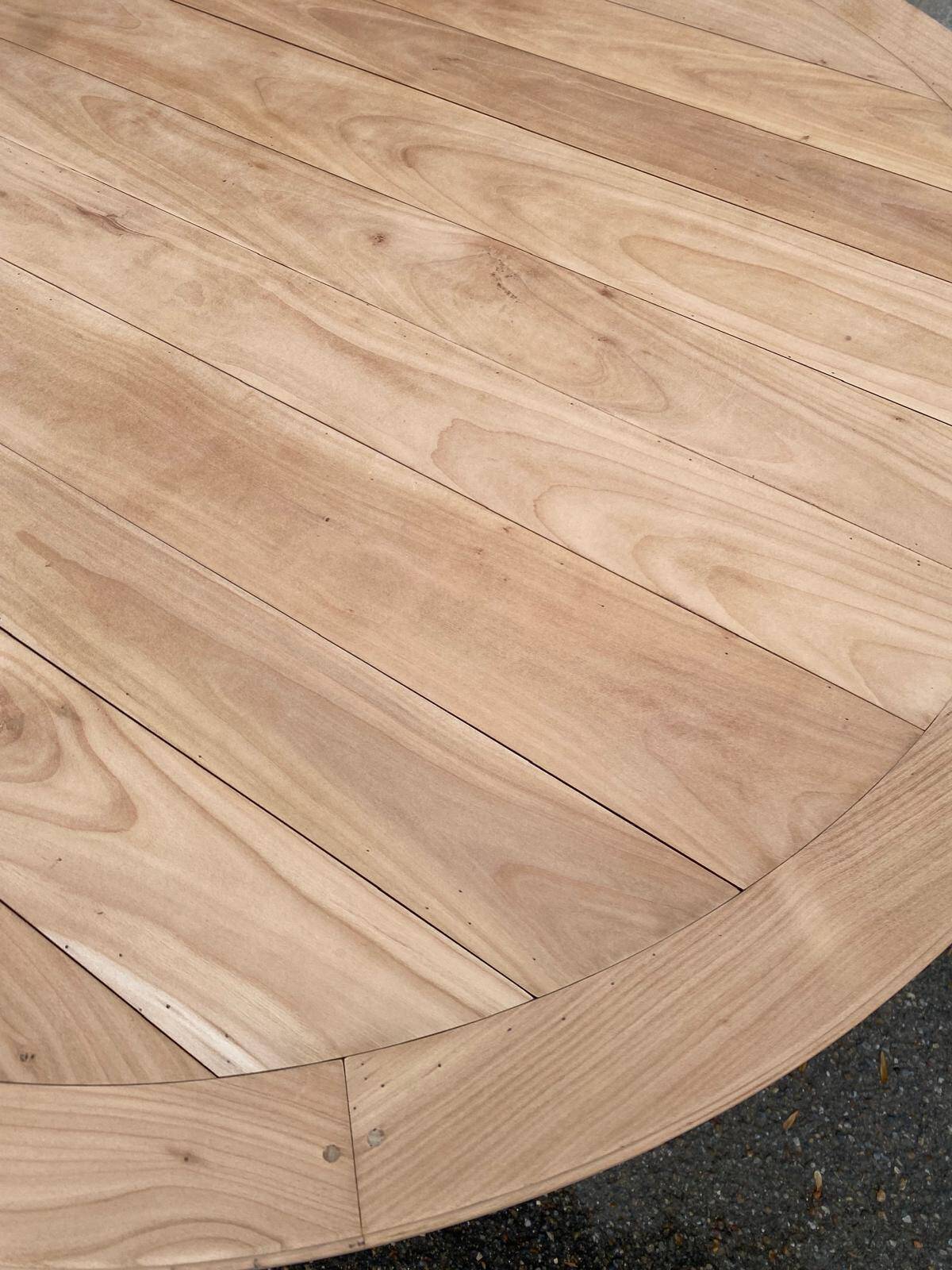 Round extendable dining table stripped in cherry wood Louis XVI René Trotel 1