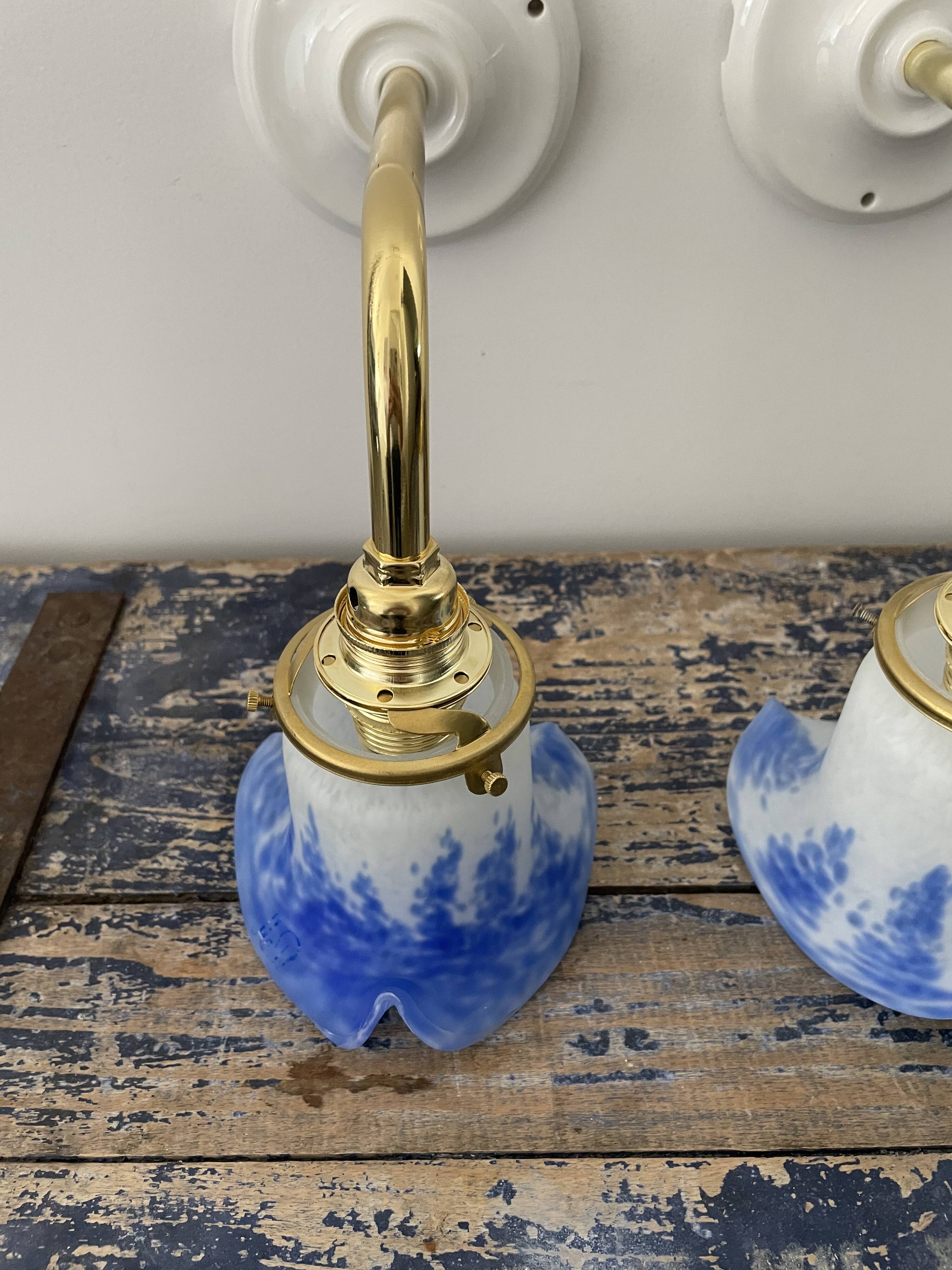 Pair of art deco wall lamps electrified to nine