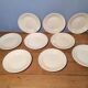 Set of  9 Digoin Saarguemines dessert plates