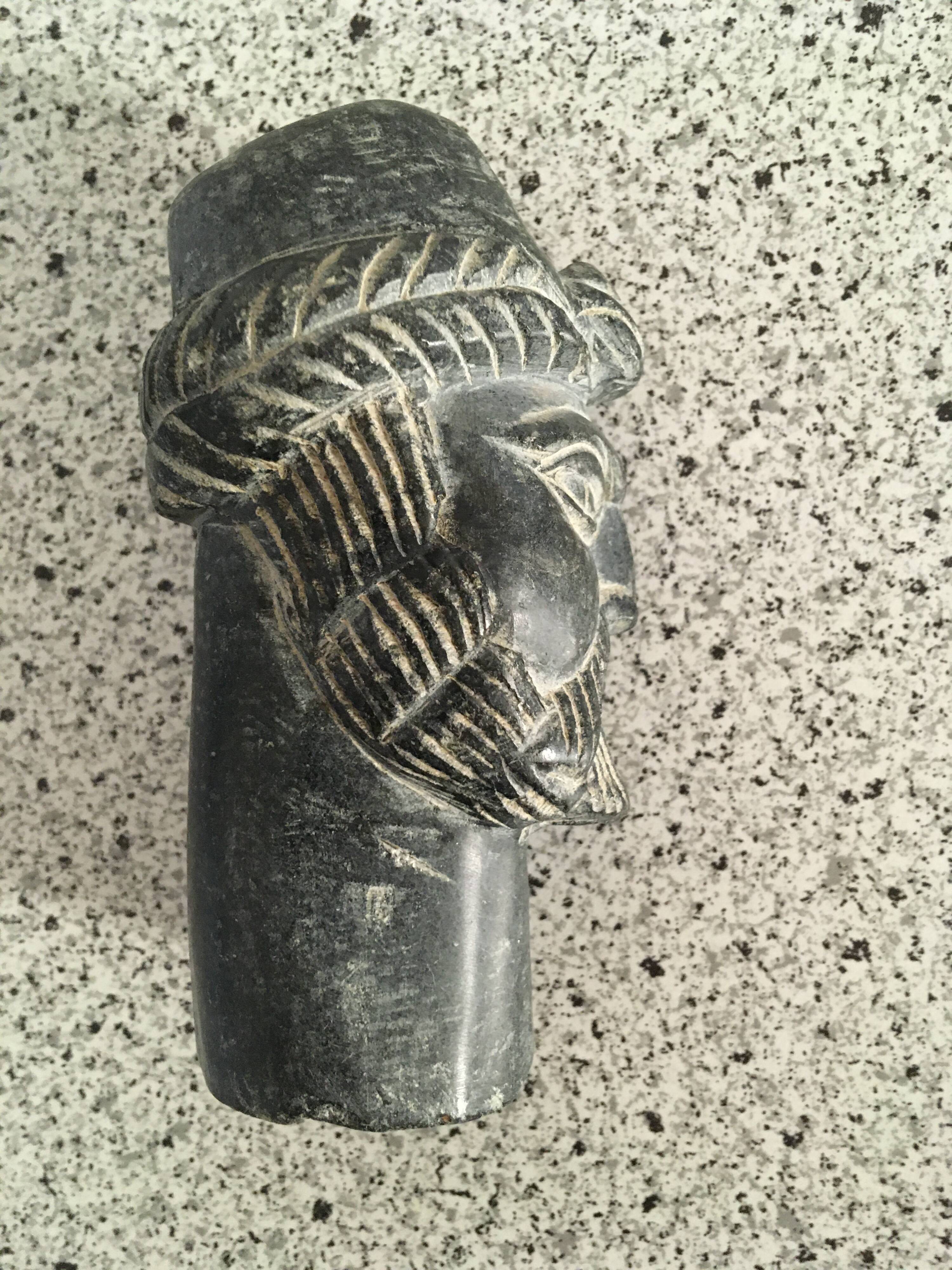 Black marble bust sculpture