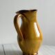 Vintage enameled ceramic pitcher - Retro mustard yellow jar.