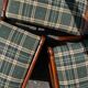 Lot of 3 vintage checkered wood and fabric chairs.