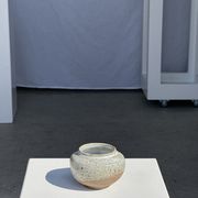 Small white ball vase tight neck in glazed speckled ceramic