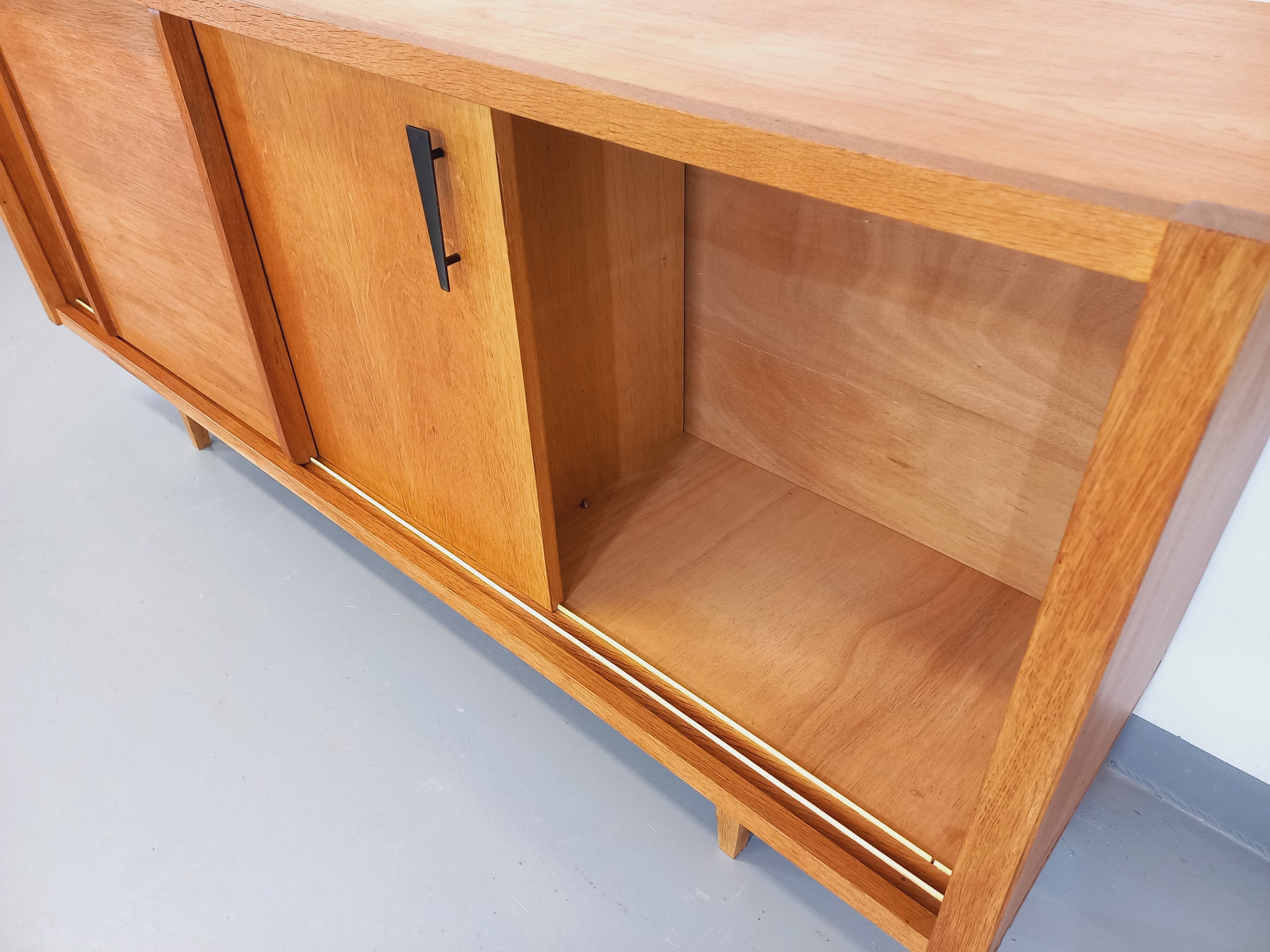 Vintage row in light oak wood from the 60s