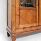 Blond wood cabinet with glass doors, 1970s.